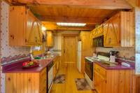 Full Kitchen of Southern Comfort 2 bedroom Pigeon Forge cabin rental